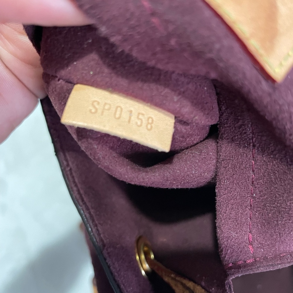 Louis Vuitton brown monogram montsouris backpack in used condition. - Picture 7 of 9